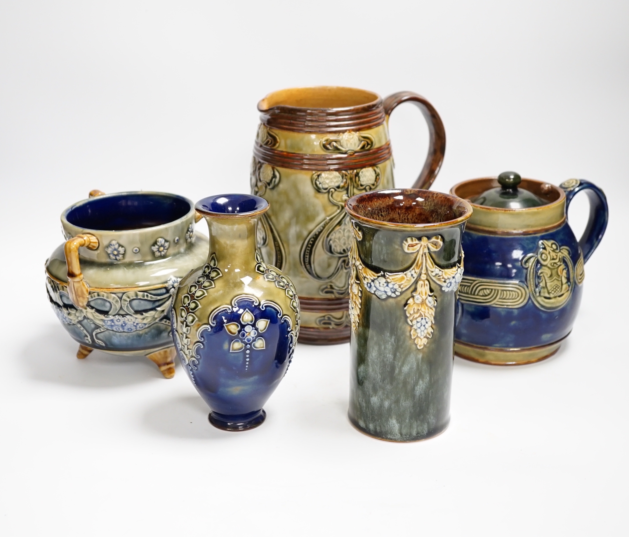 A collection of blue glazed Doulton stoneware, including vases teapots, bowl, jug and a candle holder (11)